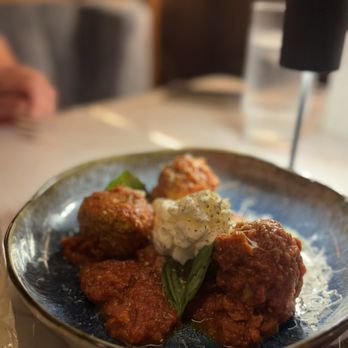 V Modern Italian signature dishes Cacio e Pepe50-Layer LasagnaWagyu MeatballsVeal Tomahawk
